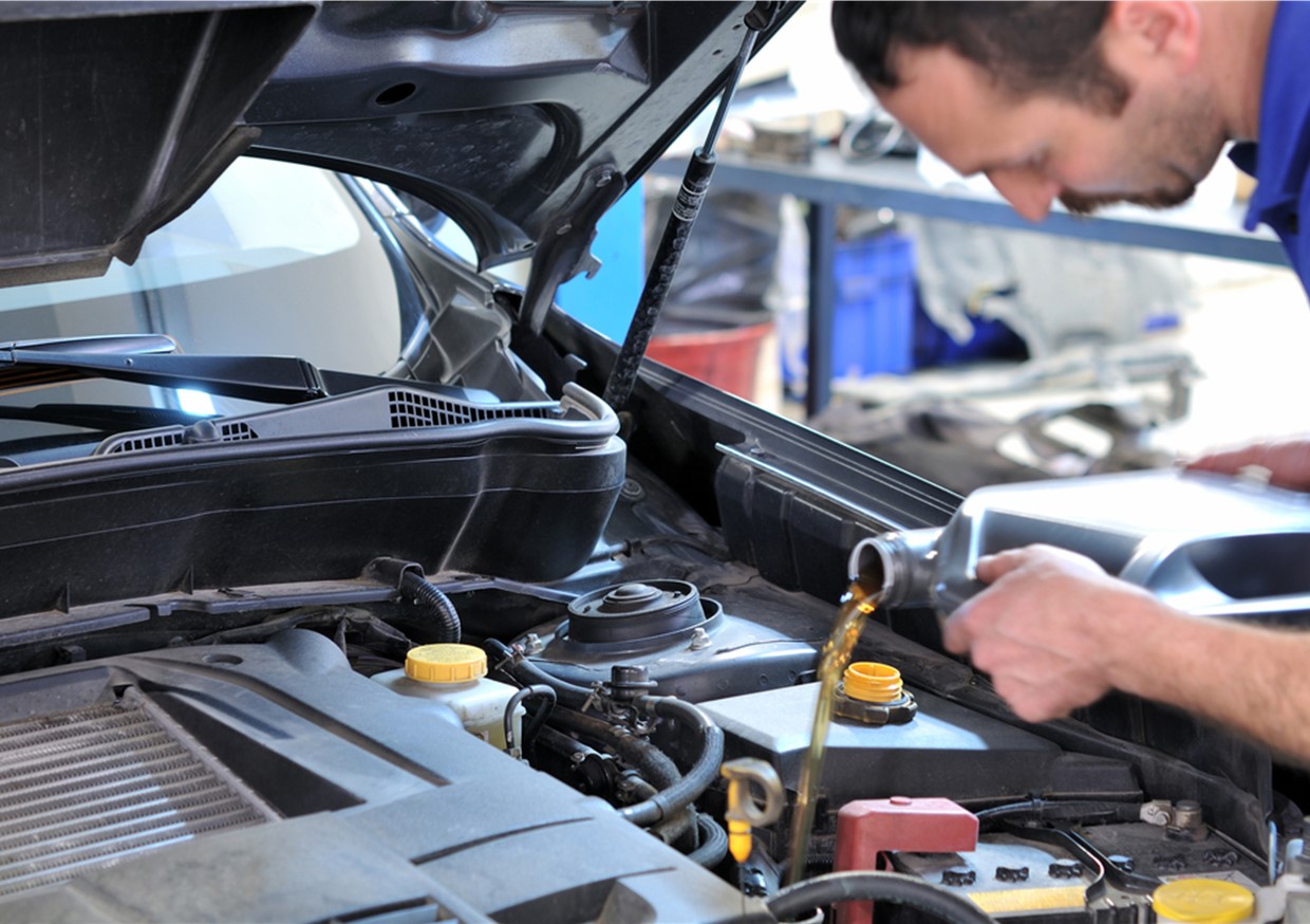 An image of a mechanic performing an MOT. Merseyside Car Repairs undertake any type of MOT failure repair and get you back on the road as quickly as possible. Covering areas like Bebington.